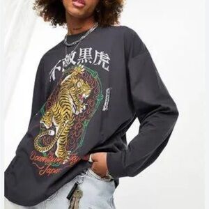 ASOS DESIGN oversized long-sleeve T-shirt in black with tiger front print